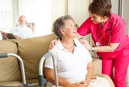 Elder Care in Marietta, GA as CNA comforts an elderly woman